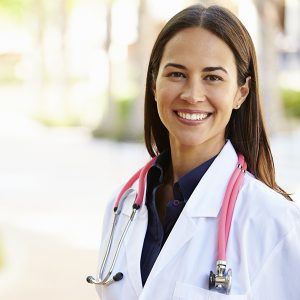 Female doctor standing outside