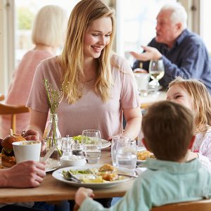 Family eating dinner in restaurant